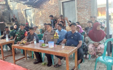 Bhabinkamtibmas Desa Joho Aipda Adung Hadiri Acara Bersih Dusun di Desa Binaan