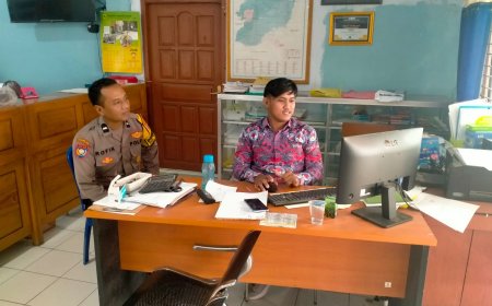 Pererat Sinergitas, Bhabinkamtibmas Polsek Balerejo Sambangi Perangkat Desa Tapelan