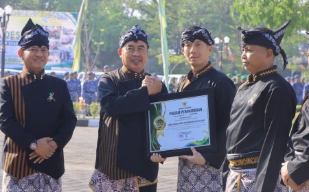 Kapolres Madiun Terima Penghargaan dari Bupati Madiun atas Dedikasi Menjaga Kondusivitas Kabupaten Madiun